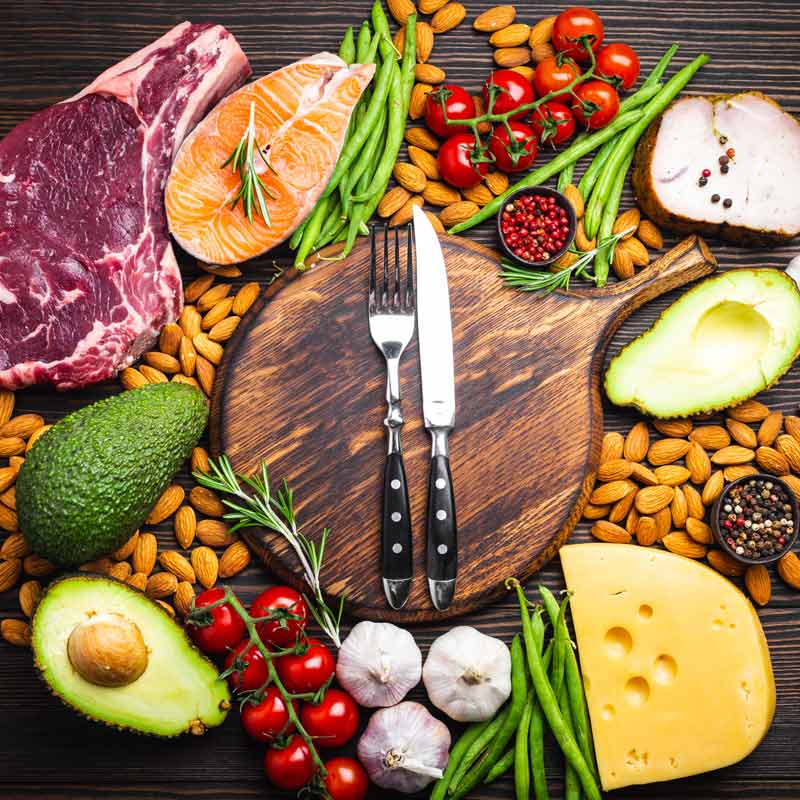 fork and knife surrounded by food
