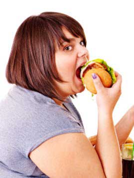 Fat girl eating burger